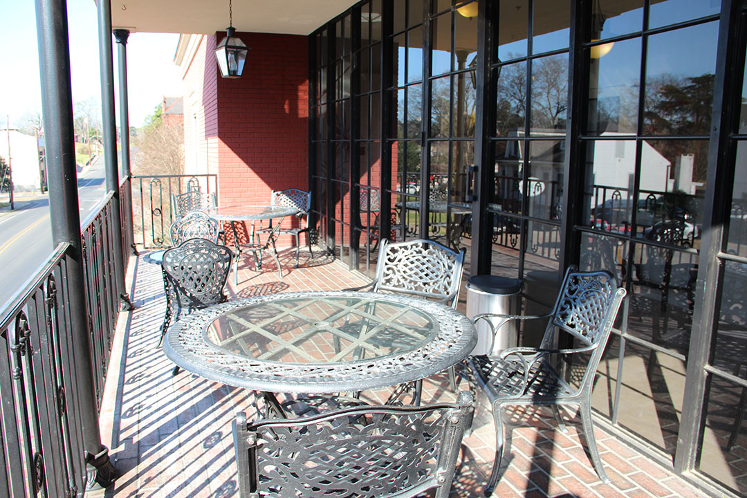 Meeting Rooms Courtyard Space Natchitoches LA Church Street Inn   Balcony Table 2 